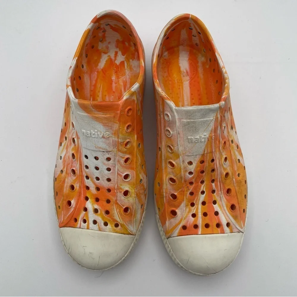 Native orange swirl slip on size 2 water shoes